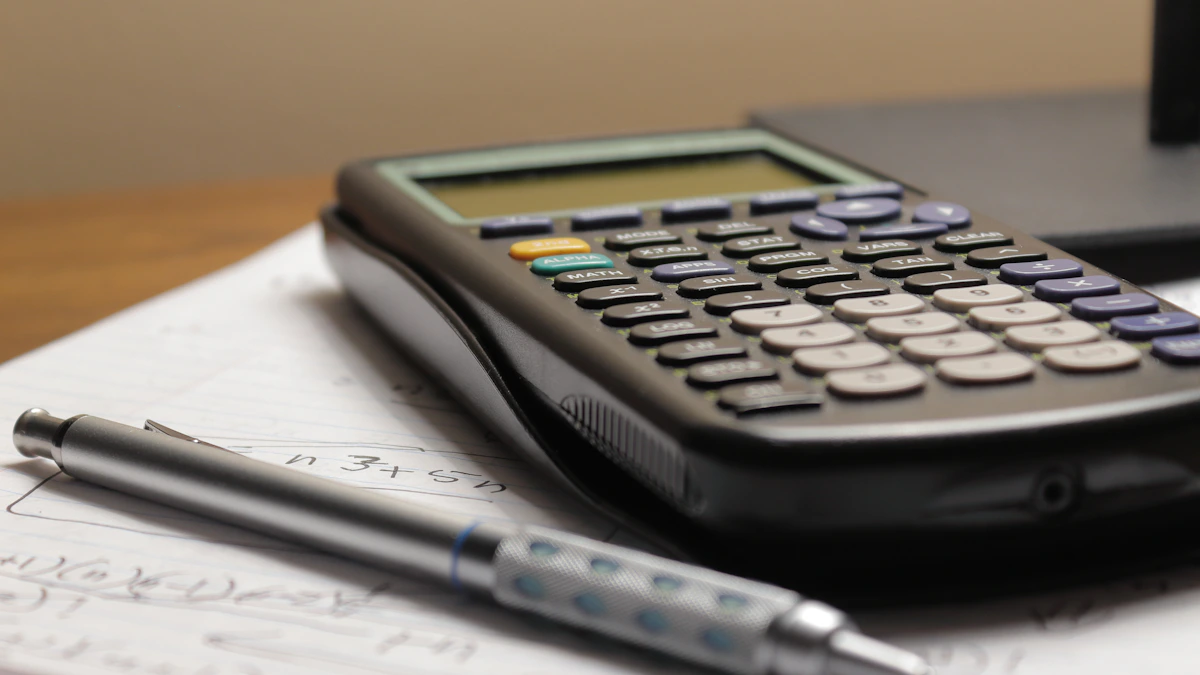 Flat-lay of cluttered email printouts, engineering drawings, sticky notes with handwritten figures, a calculator, and mechanical pencil on a worn shop desk.